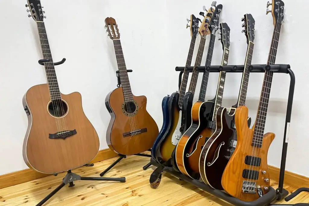 classical guitars on stands