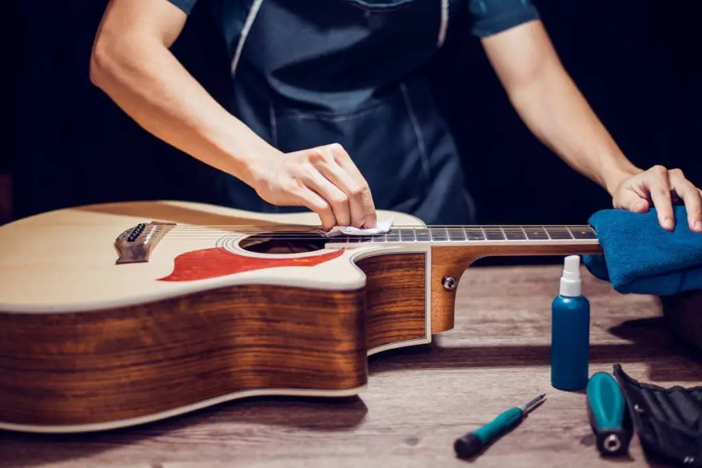 cleaning the acoustic guitar