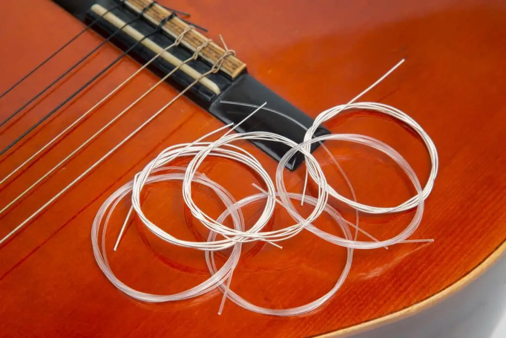 change classical guitar strings
