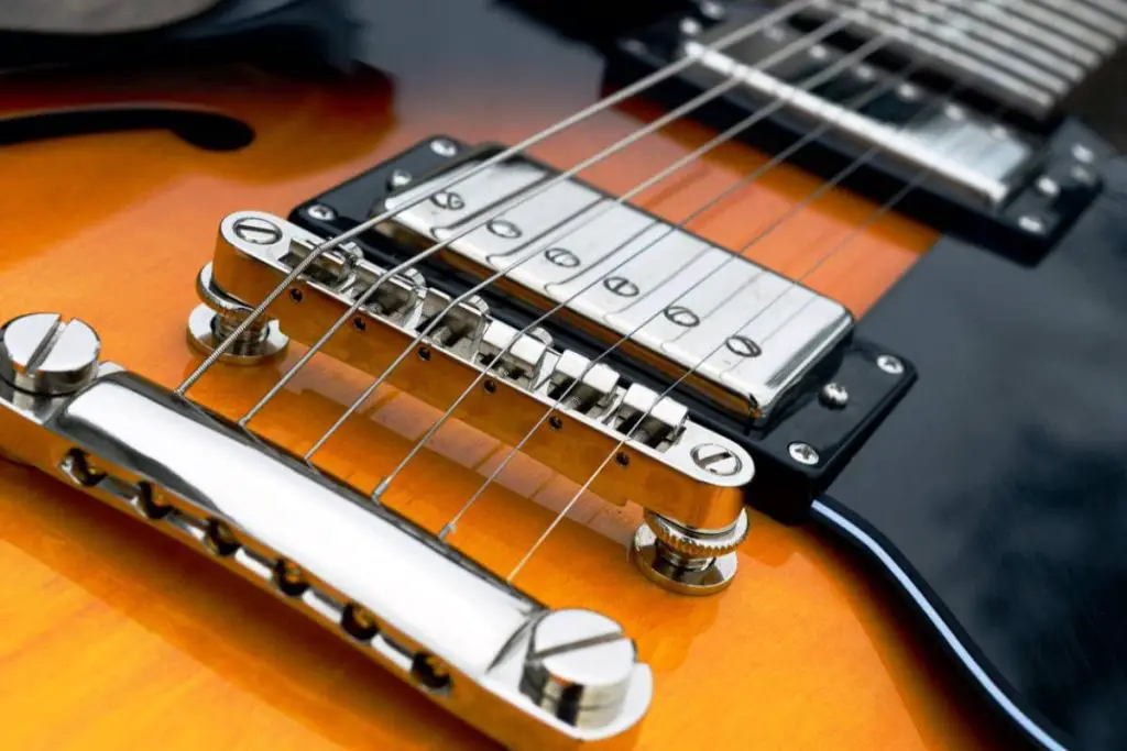 clean an electric guitar bridge