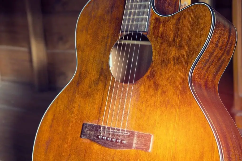 older acoustic guitar