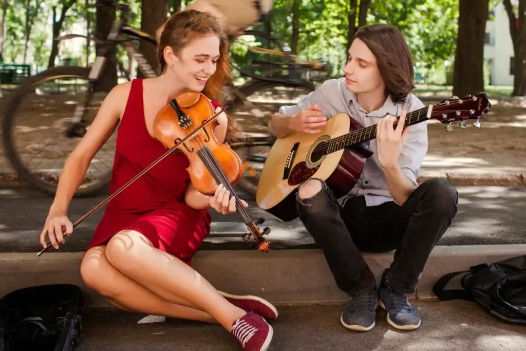 playing guitar and violin