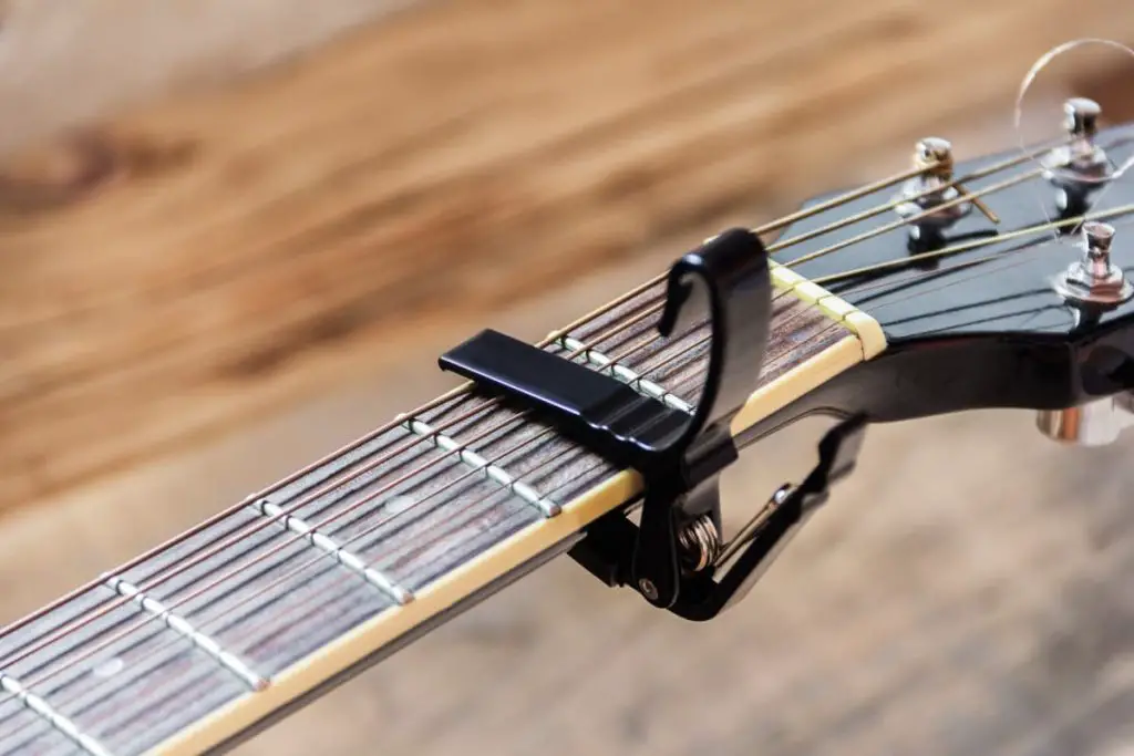 using a guitar capo