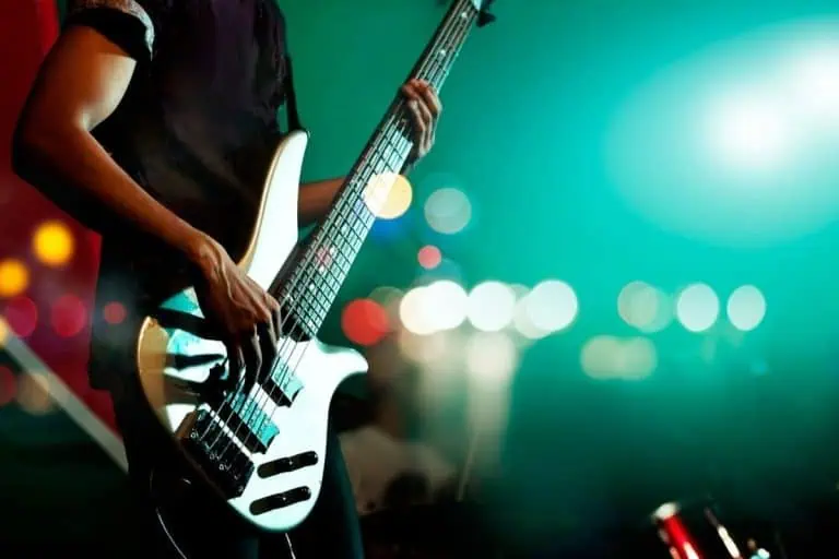 musician on stage ready to release music on Spotify