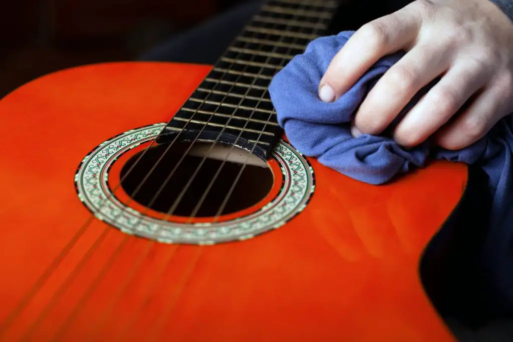 clean your guitar strings regularly