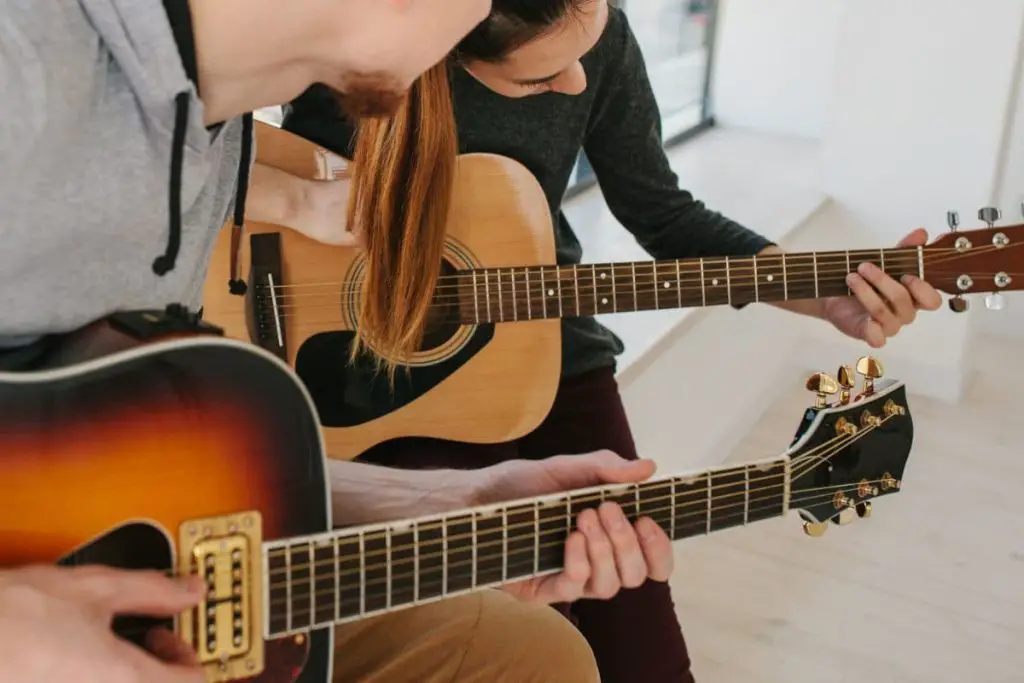 play guitar with other people