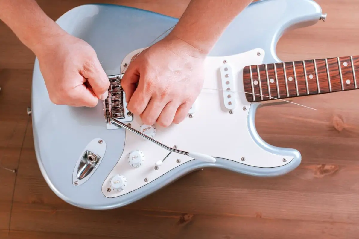 put an electric guitar back together