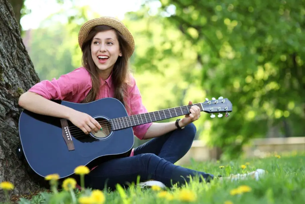 solo with an acoustic guitar