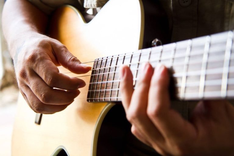 Why is Your Guitar Tapping Not Making Sound? 9 Reasons