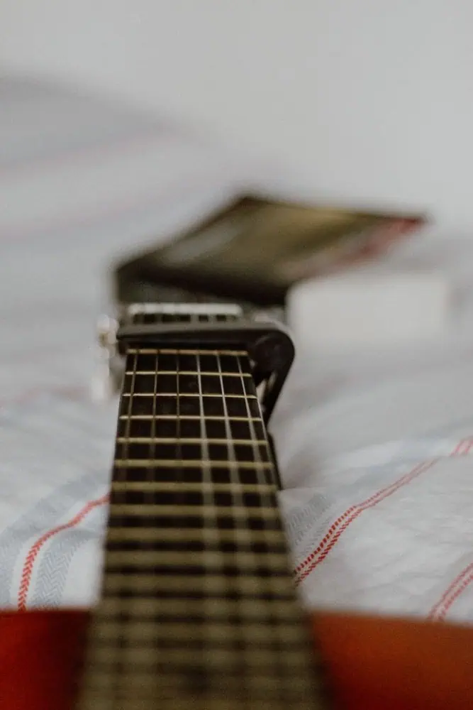 How to Transpose Guitar Chords to Any Key (With Charts)