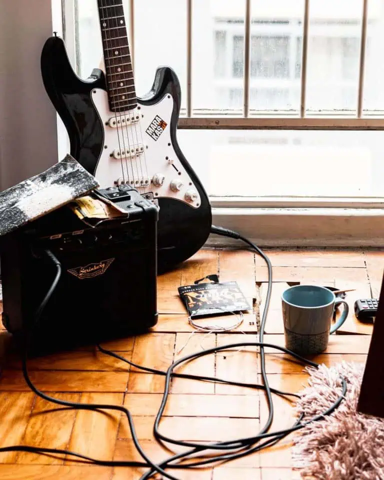 Electric guitar and amp in a home studio, set up to mix electric guitar