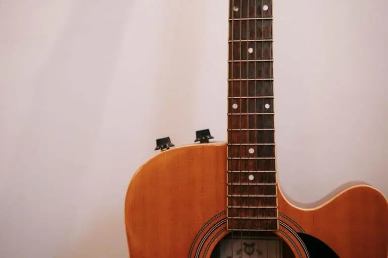 Acoustic guitar neck and headstock showing what makes the best guitar necks comfortable